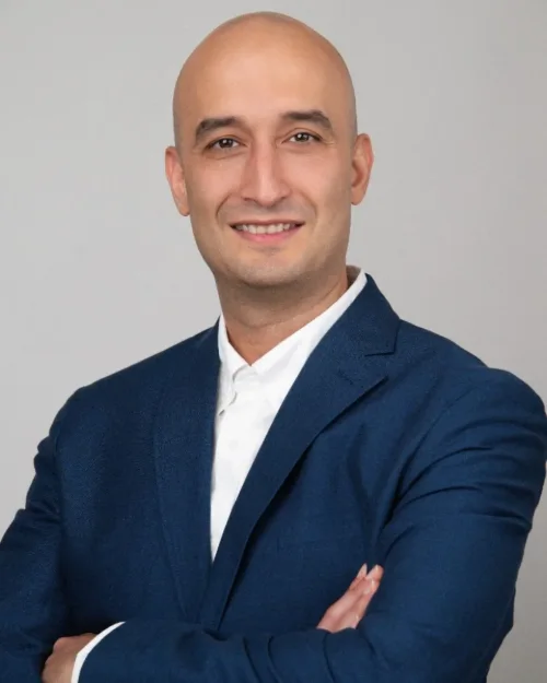 Executive headshot of a man in a navy suit photographed in Langley BC