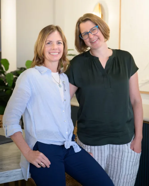 Personal branding portrait of two business partners photographed in their studio