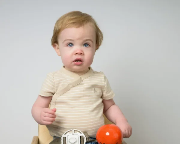 A preschooler photographed on picture day at a childcare centre