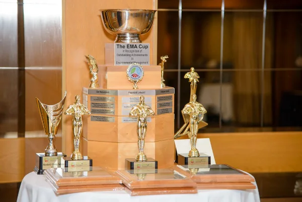 Perpetual trophies waiting on the display table before the awards presentation begins