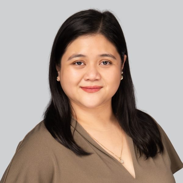 Event headshot booth portrait of a woman in an olive top