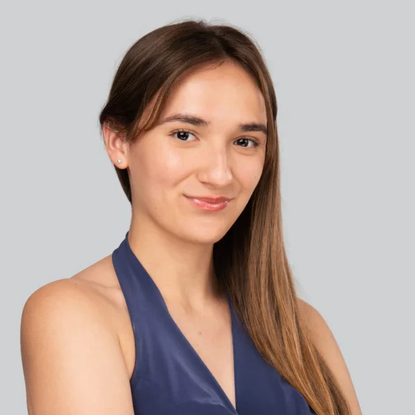 Event headshot booth portrait of a woman in a navy top