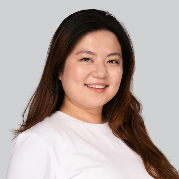Event headshot booth portrait of a woman in a white top