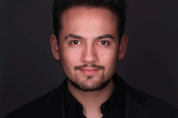 Theatrical actor headshot with moody lighting photographed in Langley BC
