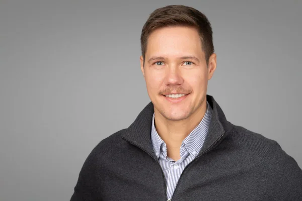 Corporate team headshot of Ivan photographed for Arndt with matching lighting