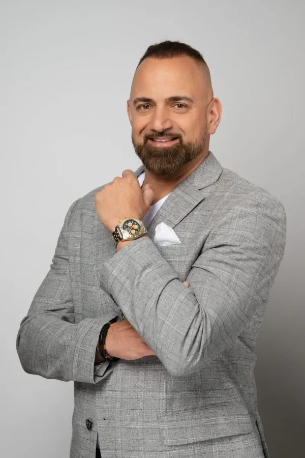 Real estate agent branding headshot in a grey blazer, Langley studio