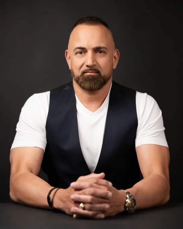 Personal branding headshot on a dark backdrop, Surrey and Fraser Valley