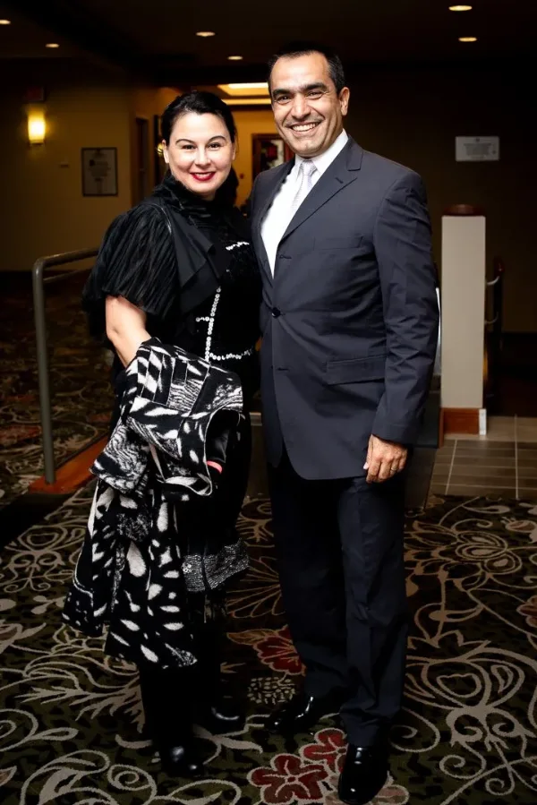 Couple in formal dress photographed together at an evening celebration in Vancouver