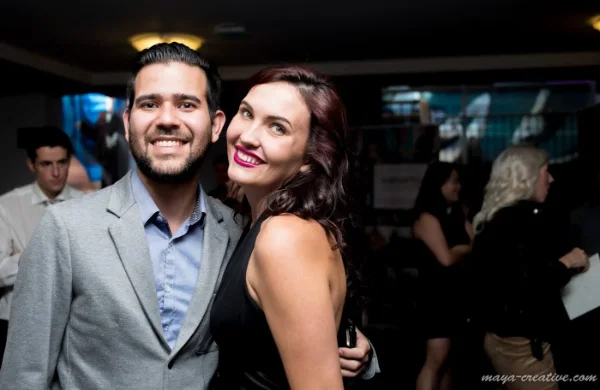 Couple celebrating together at a graduation party reception
