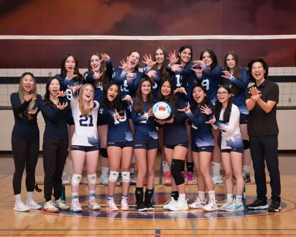 Club volleyball team and coaches photographed at a Lower Mainland photo night