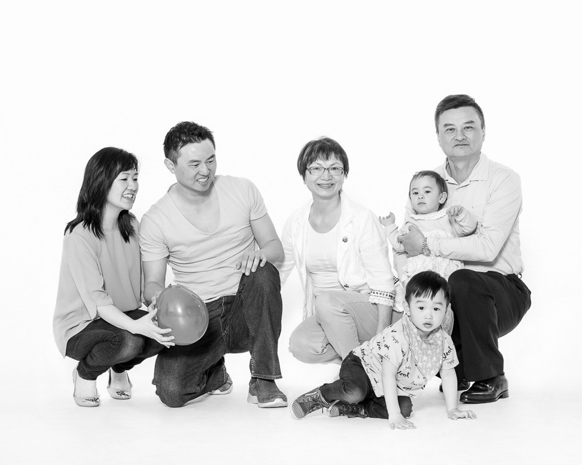 Multi-generational family portrait in black and white during a studio mini session