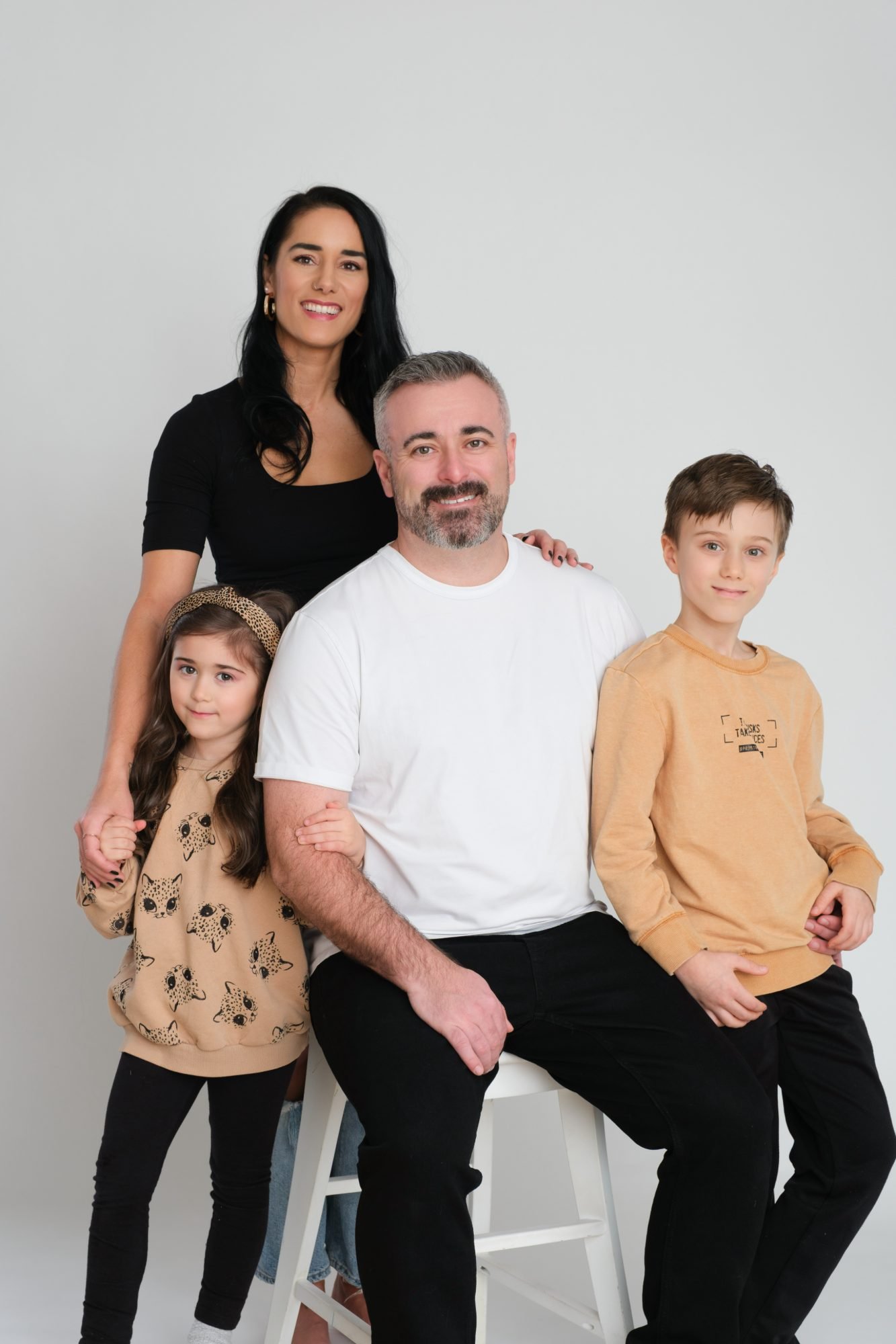 Family gathered in the studio during a Christmas mini session