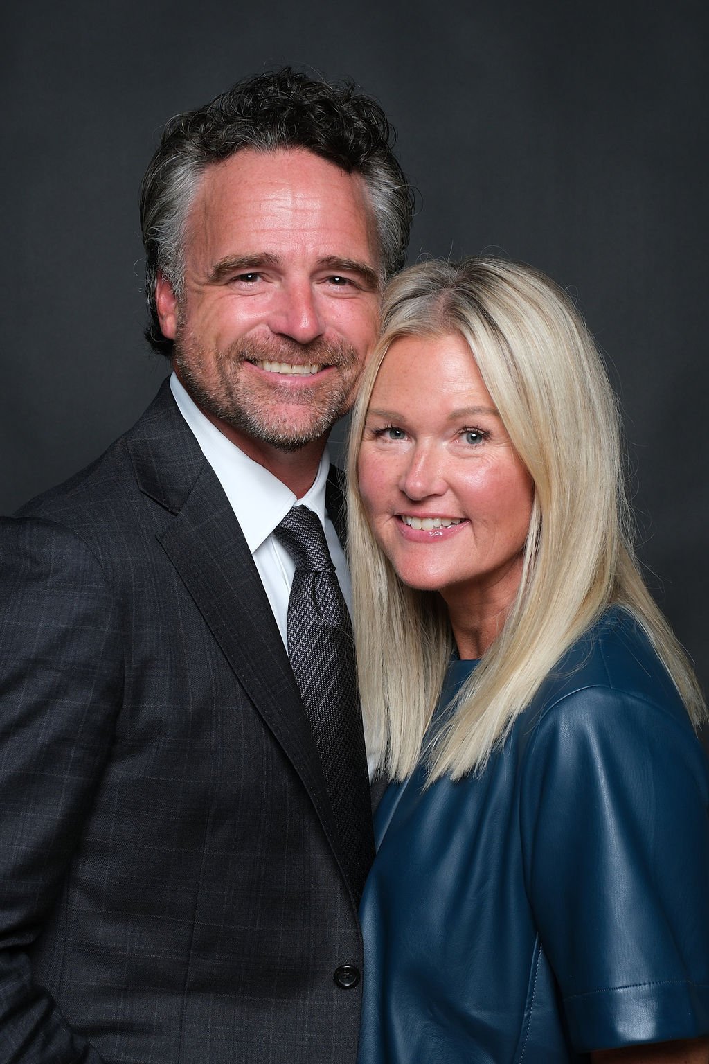 Couple in formal evening wear at the event portrait station