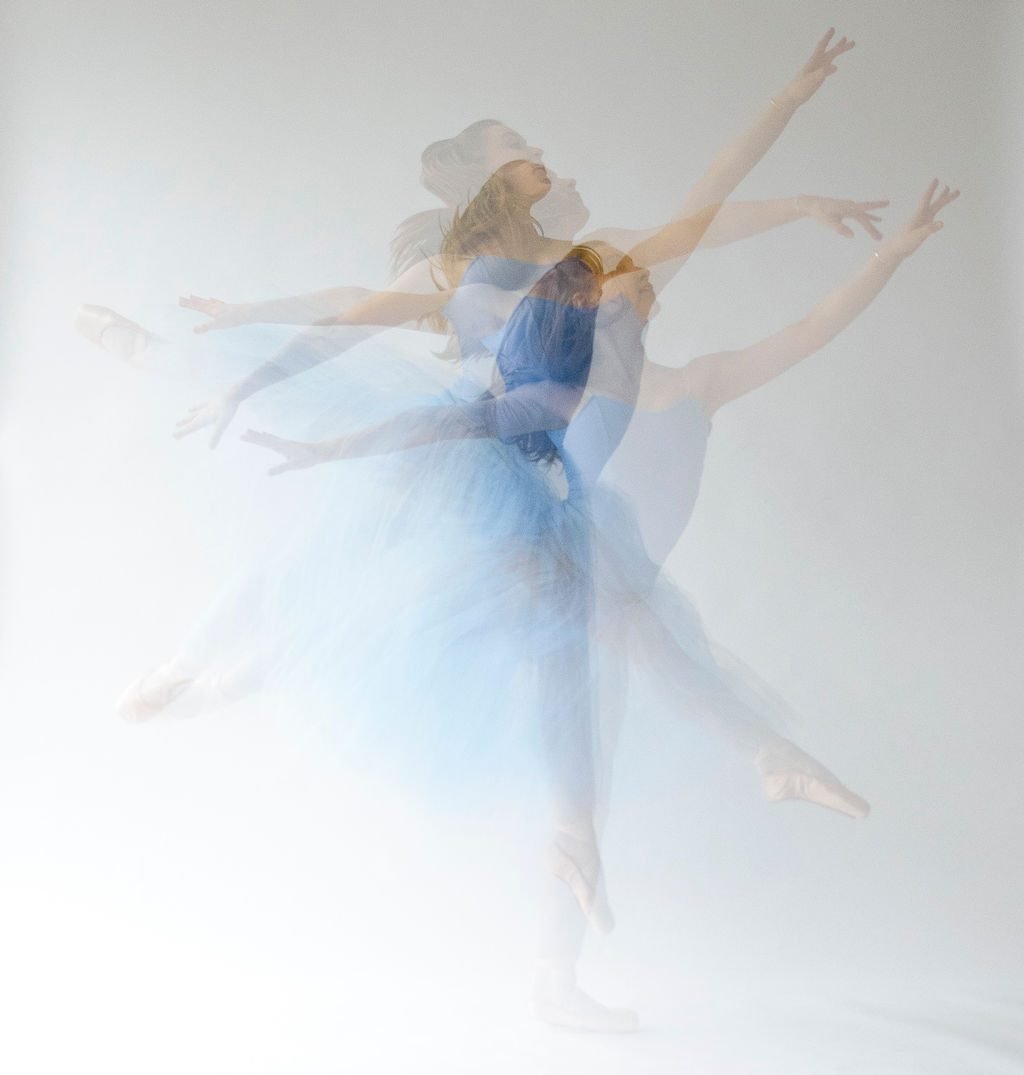 Multiple exposure ballet portrait of a dancer in a blue costume
