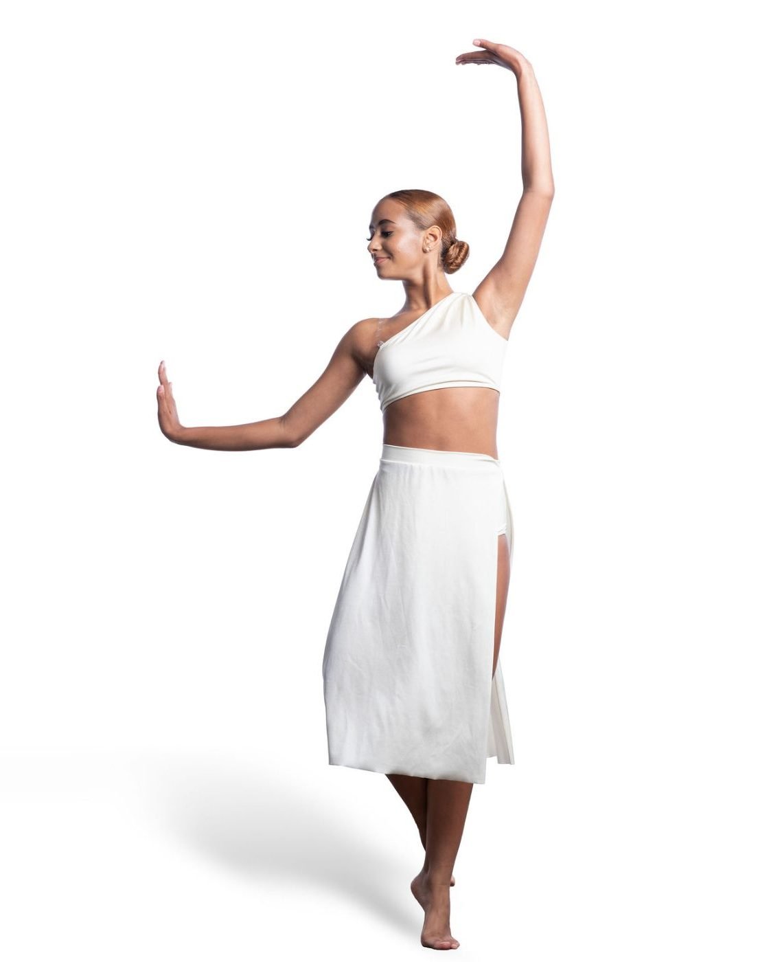 Dance costume portrait with arms raised, photographed for a recital program