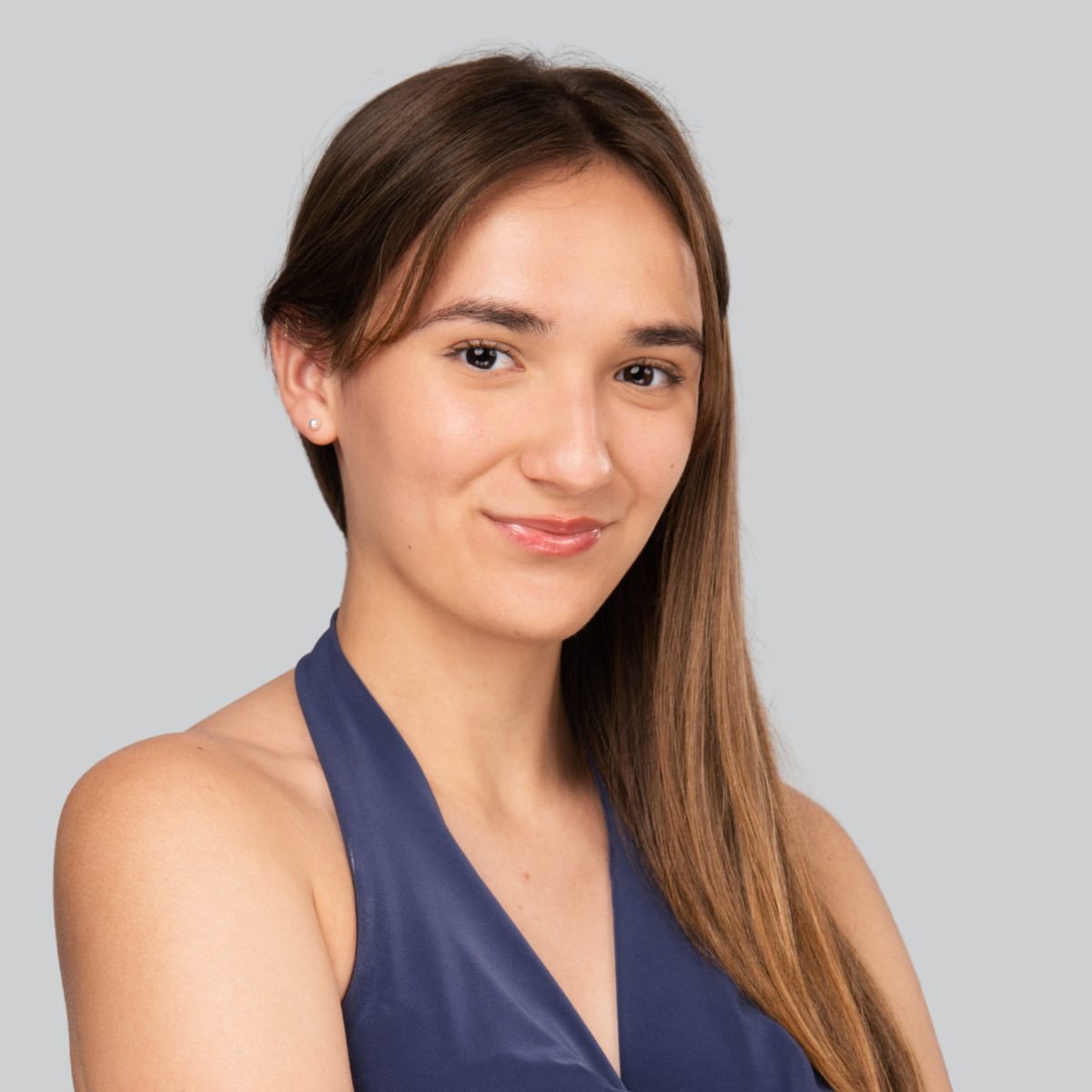 Event headshot booth portrait of a woman in a navy top