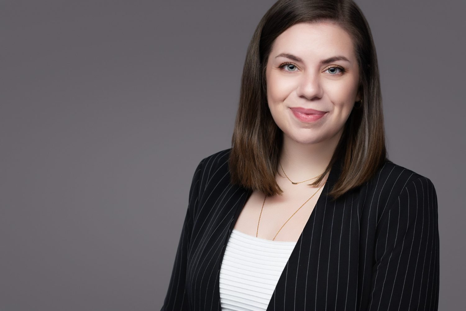 Professional headshot of Ester Gherea of Gherea Studio