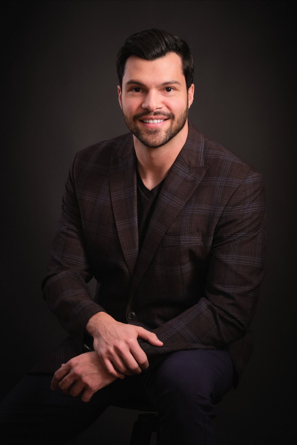 Professional headshot of Murilo Tavares, owner of Rank My Business