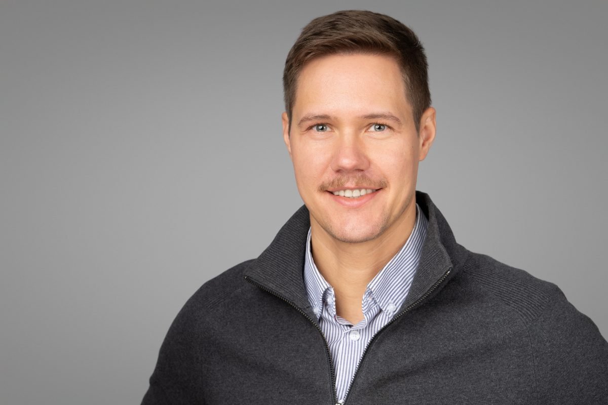 Corporate team headshot of Ivan photographed for Arndt with matching lighting