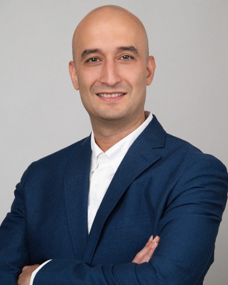 Executive headshot of a man in a navy suit photographed in Langley BC
