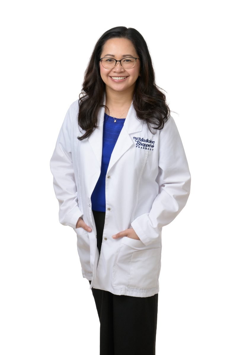 Medical headshot of Jeanie Abe in a white coat on a white background