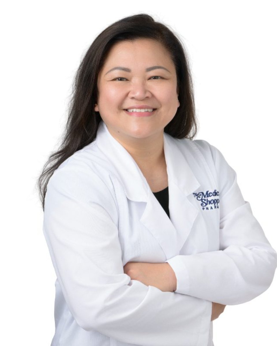 Medical headshot of Melissa Santiago in a white coat on a white background