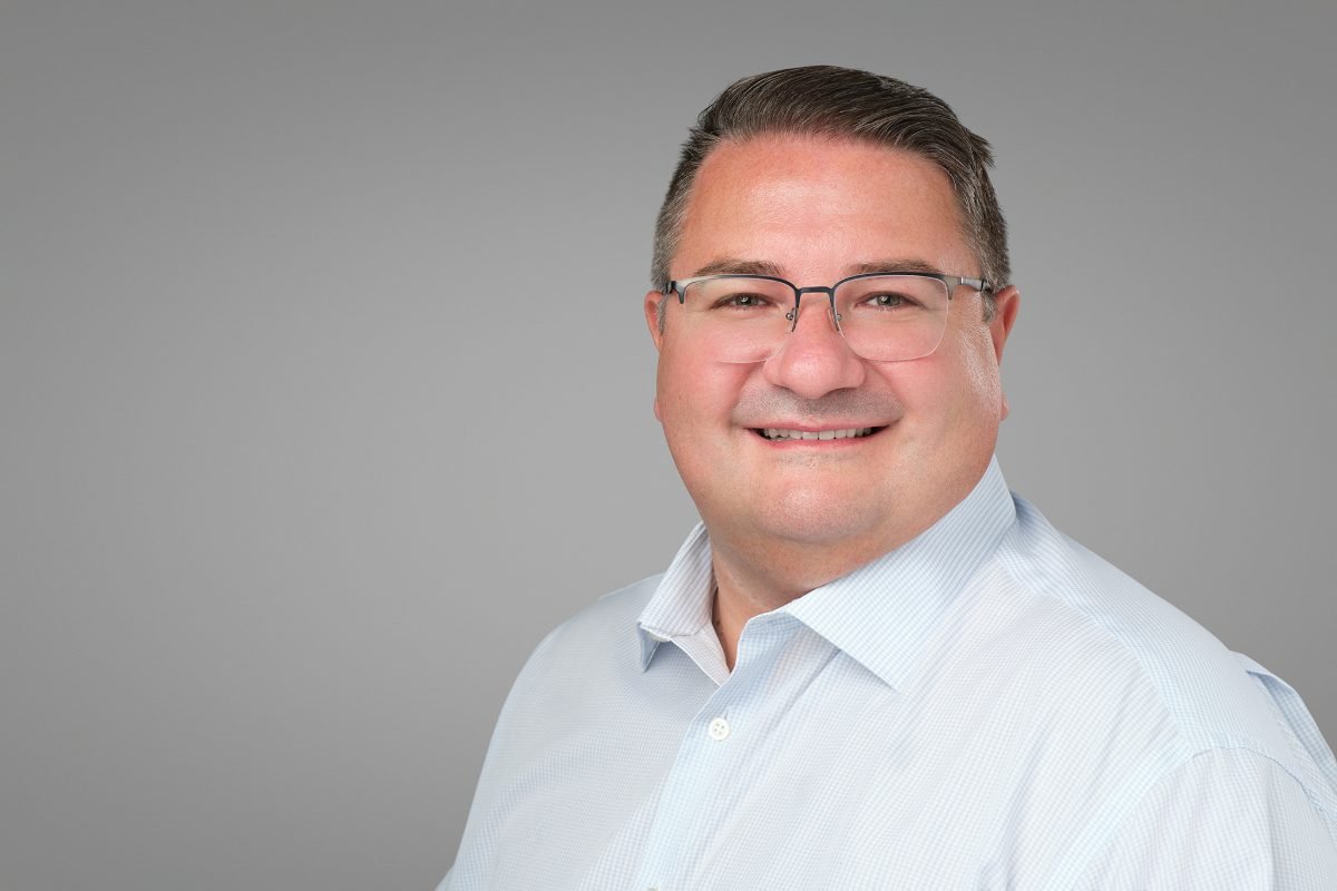 Team headshot of Ian Mitchell of Collective Technologies with matching crop