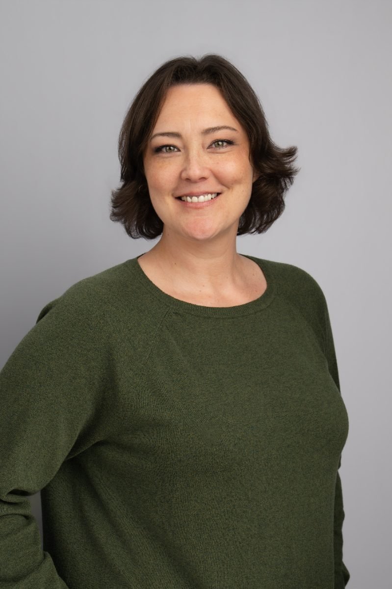 Team headshot of Kym from Core Mechanical photographed at their office