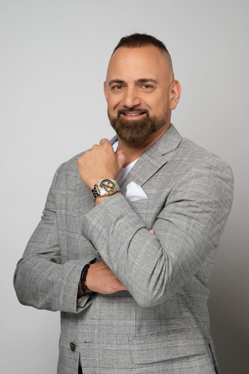Real estate agent branding headshot in a grey blazer, Langley studio