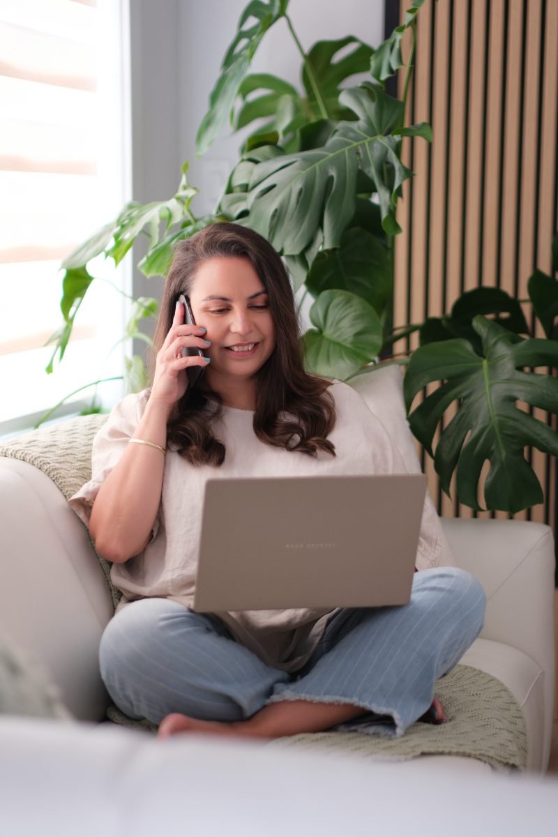 Lifestyle branding photo of a business owner working on a laptop