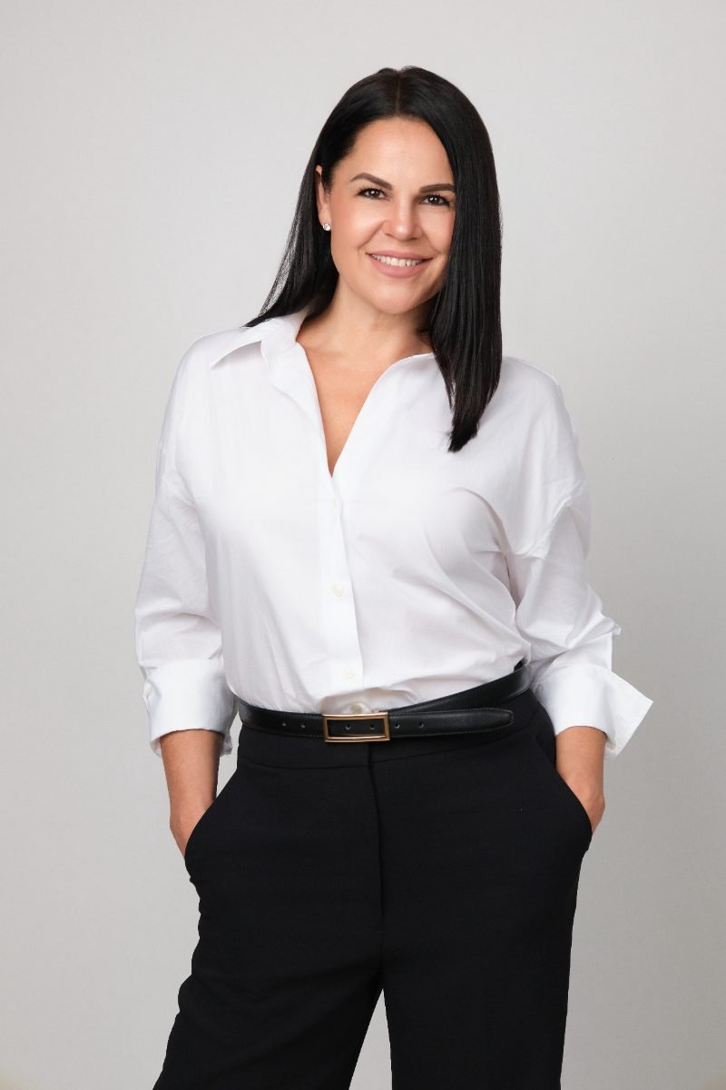 Standing personal branding portrait of Corinne Pederson in the Langley studio