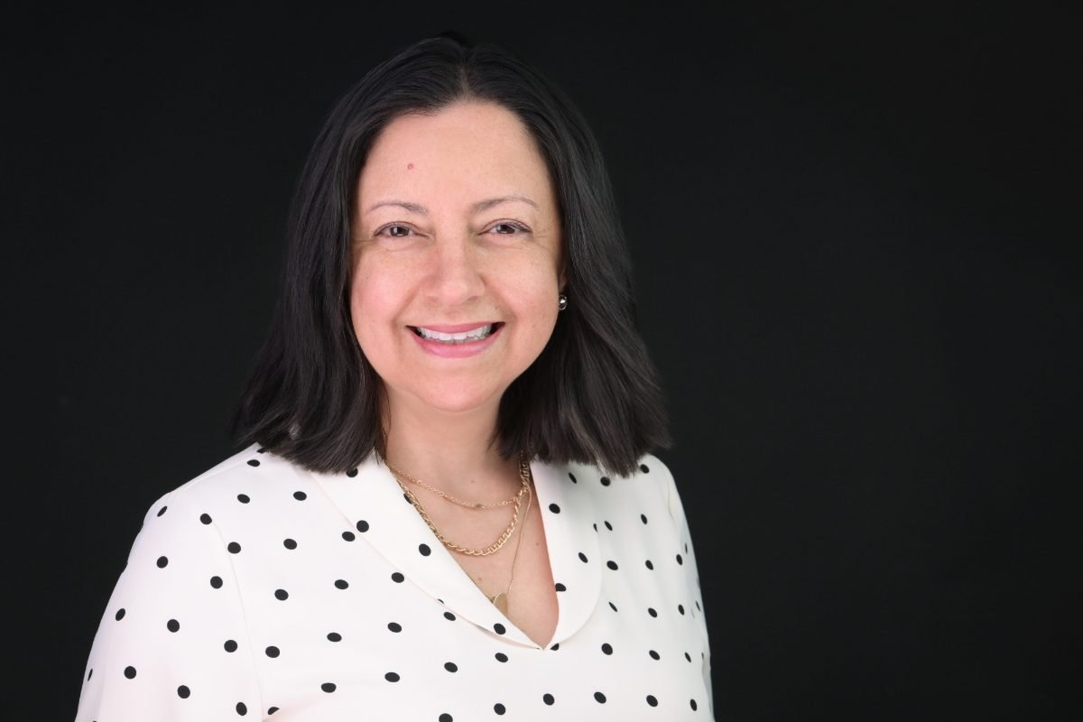 Law firm headshot on a dark backdrop photographed in Langley BC