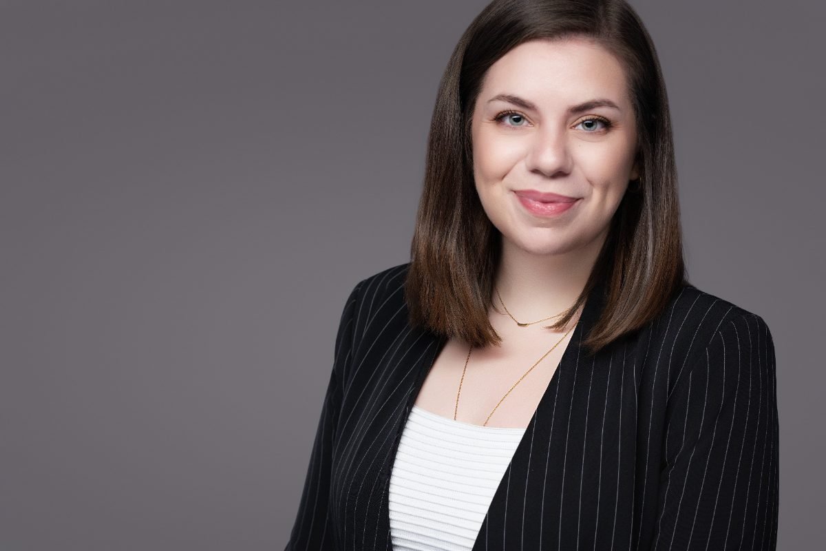 Professional headshot of Ester Gherea for a law firm bio page