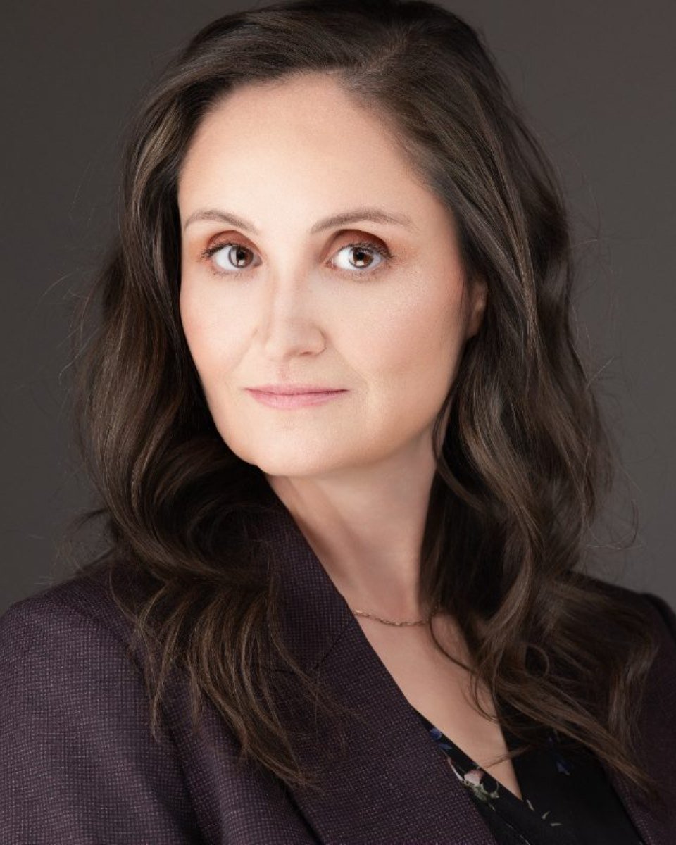 Professional headshot of Jenny Holly Hansen photographed in the Langley studio