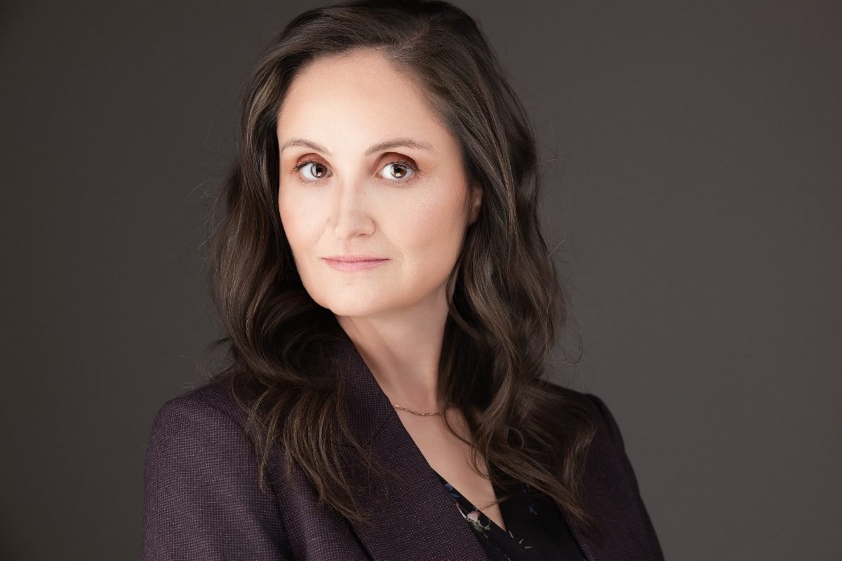 Professional headshot of Jenny Holly Hansen for a firm profile page