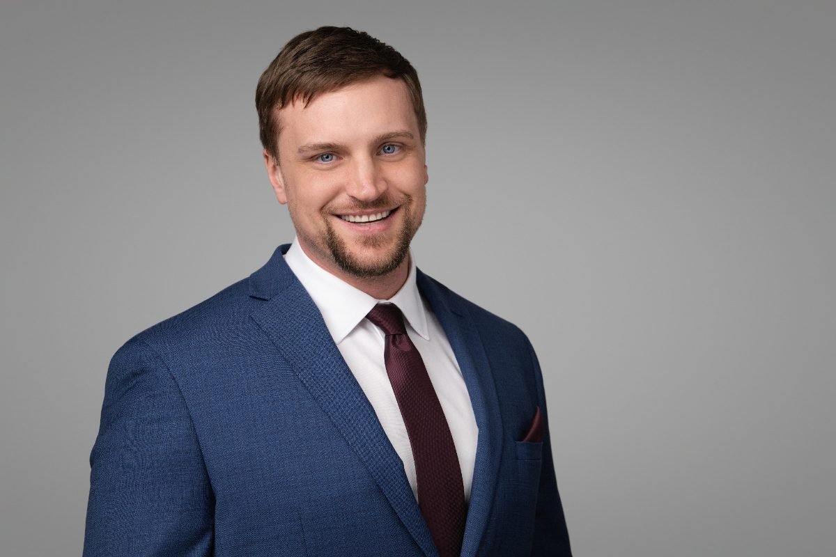 Real estate headshot of realtor Lucas Plonka photographed in the Langley studio