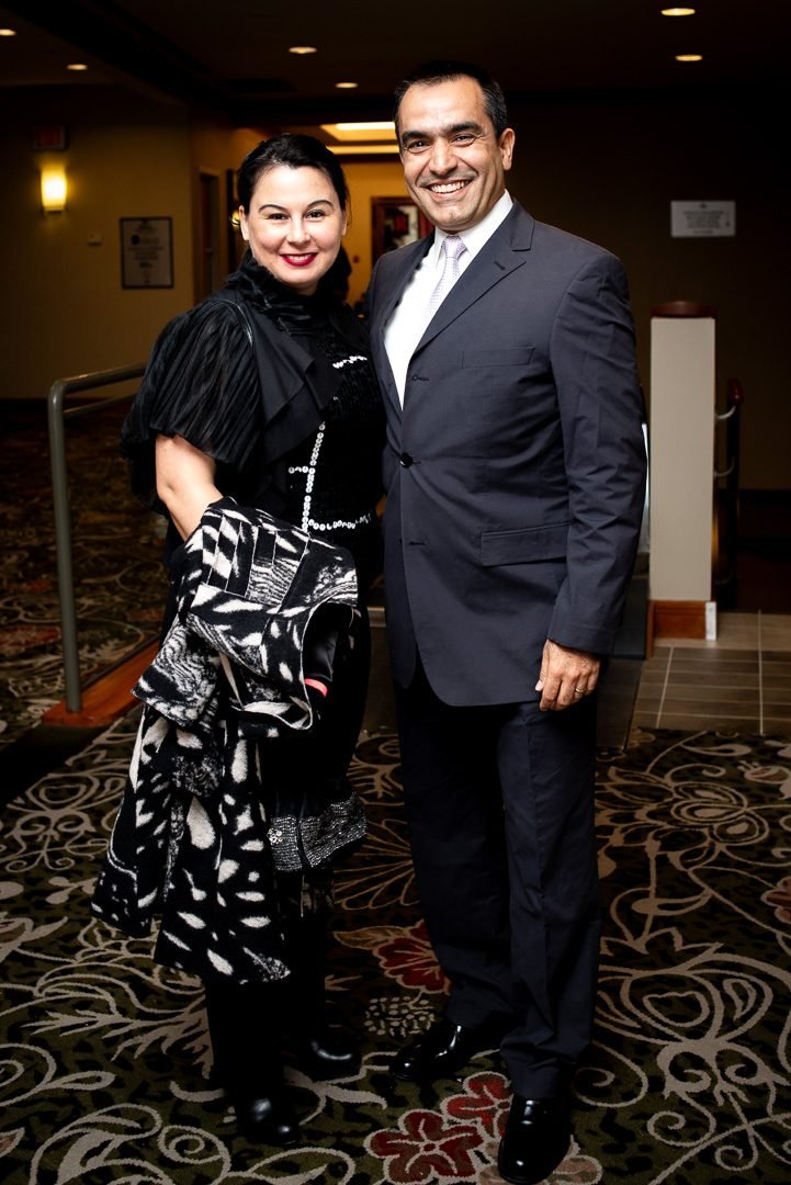 Couple in formal dress photographed together at an evening celebration in Vancouver
