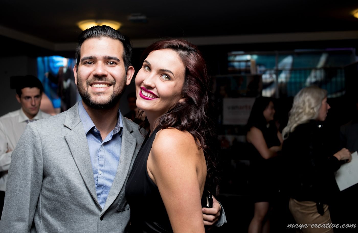 Couple celebrating together at a graduation party reception