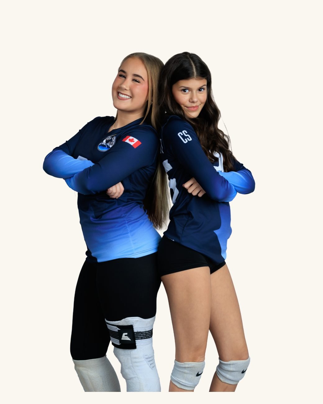 Two volleyball teammates photographed together in the studio