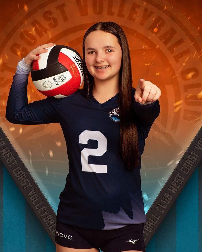 Volleyball player banner portrait with the ball raised in club kit