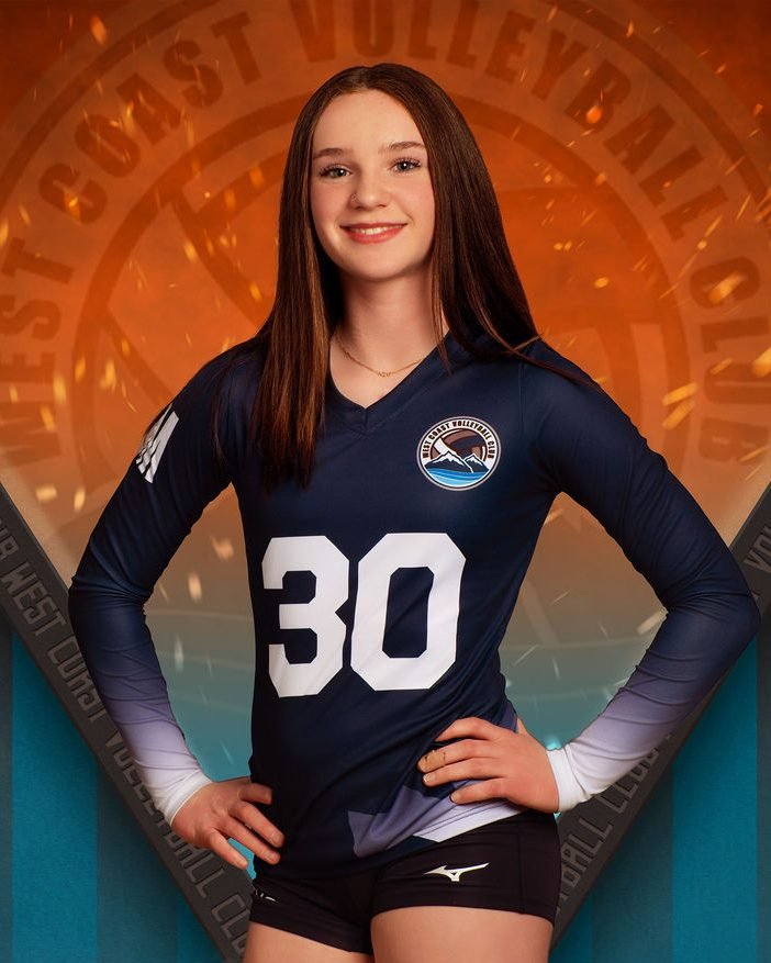 Volleyball player portrait in club kit photographed at a team photo night
